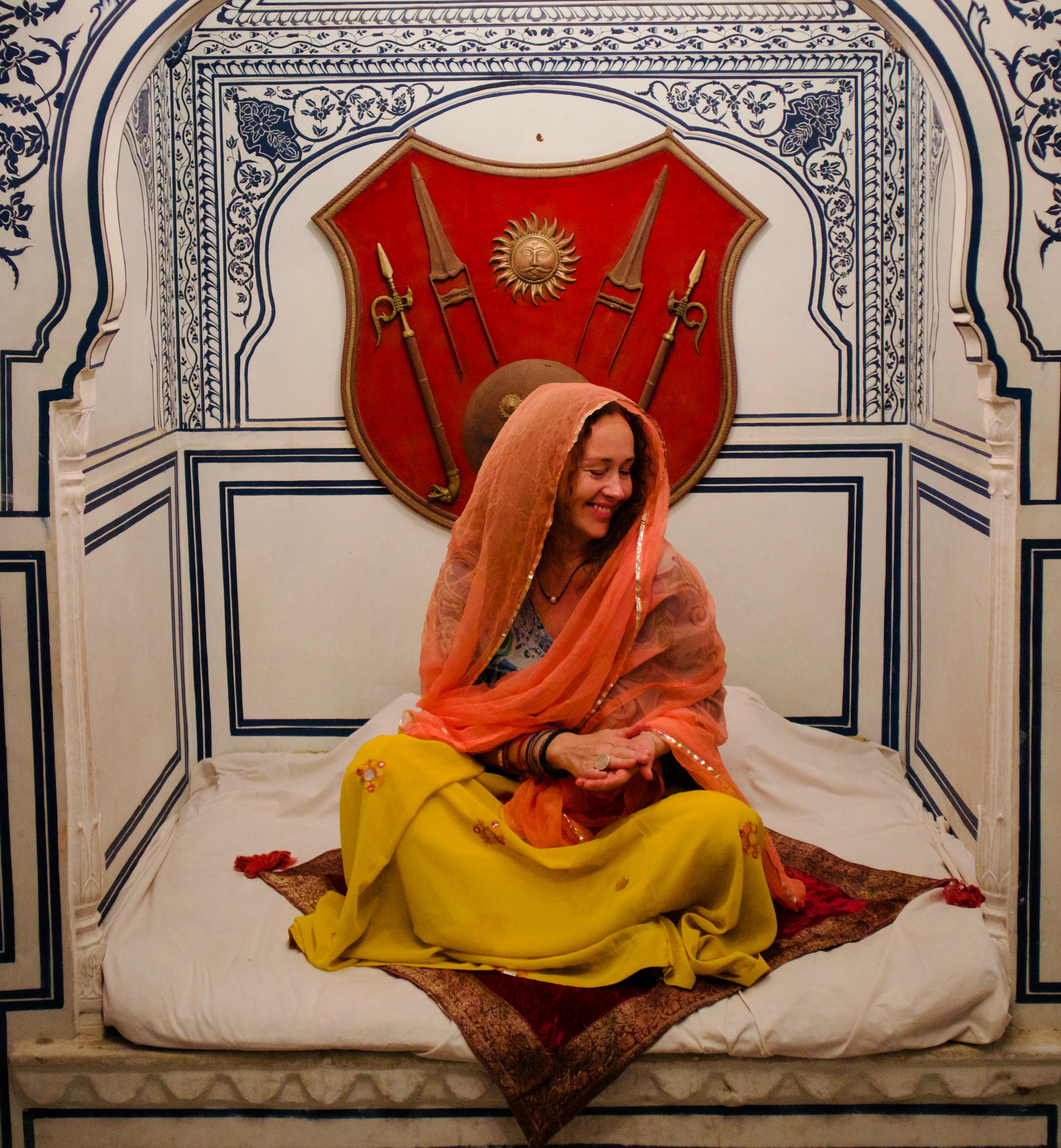 Joanna Sullivan sitting at a sacred site in India